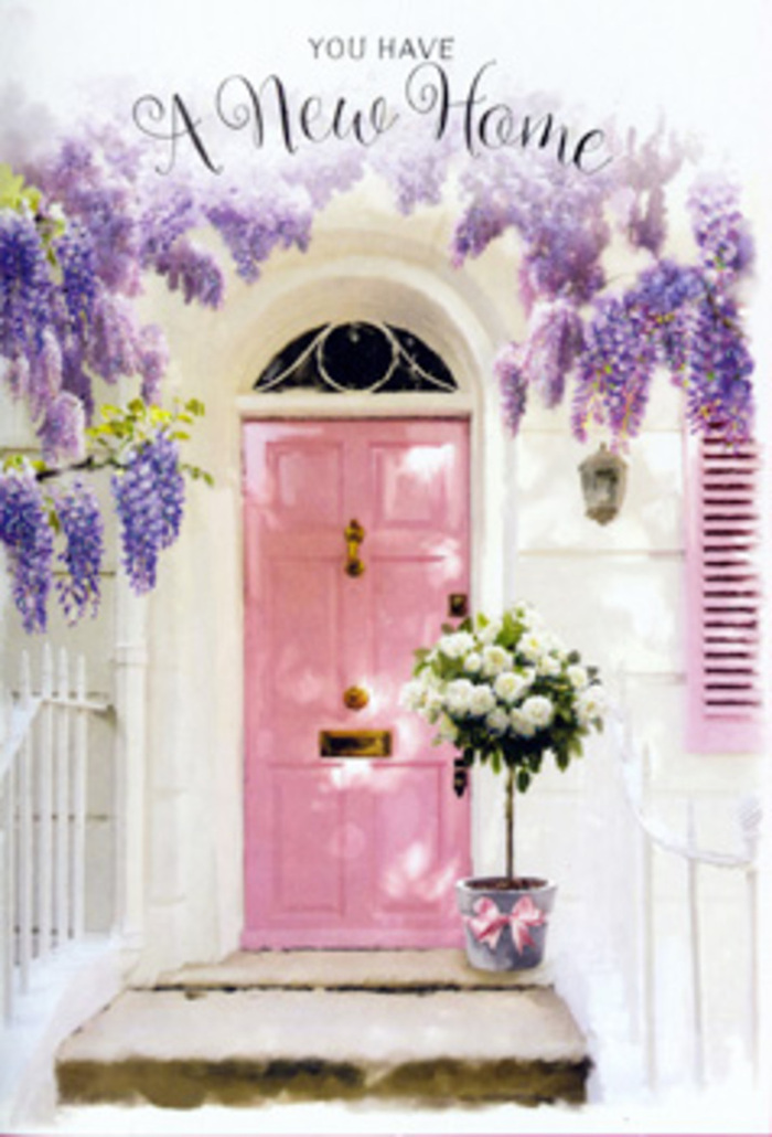 This serene doorway scene in Kentish Town feels like arriving at a storybook home on a gentle spring afternoon. The front door is painted in a soothing shade of pink, somewhere between blush and rose, with a soft, matte finish that glows quietly rather than shouts. It is framed by whitewashed walls and a delicately painted shutter, both of which catch the natural daylight that often filters down the residential streets near Lady Somerset Road and Fortess Road. Draped above and around this entrance, wisteria hangs in velvety cascades of pale lavender and lilac, each blossom forming a trailing cluster that softens the lines of the building. The wisteria's abundance creates a fragrant canopy that seems almost to lean in protectively over the threshold. On the step, a weathered grey bucket sits resolutely, yet tenderly, at the centre of the composition. Within it, a florist's hand-tied arrangement brims with plush white and cream roses, their petals layered like folded silk, interspersed with sprigs of soft green foliage to provide contrast and movement. A satin ribbon in a gentle pink is tied carefully around the bucket, its sheen catching the light in small highlights. The stepping stone beneath is warmed by soft, dappled shadows, suggesting late afternoon sunshine, the kind you might notice returning home from a stroll along Kentish Town's leafy side streets. The overall feeling is of quiet celebration: a thoughtful housewarming gesture, a floral welcome designed to ease nerves and amplify joy for whoever has just moved in. It is as if the flowers themselves are whispering, this is where your new memories begin.